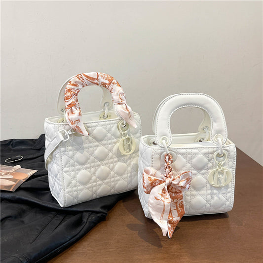 BOW LUX HANDBAG